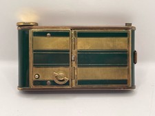 Cigarette case powder compact