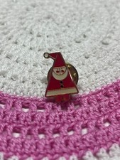 CHRISTMAS THEMED ENAMEL PIN BADGE FEATURING A STYLISED SANTA CLAUS