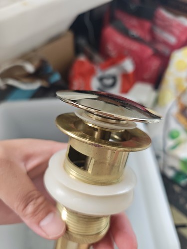 Gold colour pop basin waste - up,
