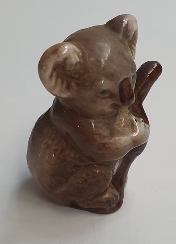Beswick koala bear climbing - beswick,