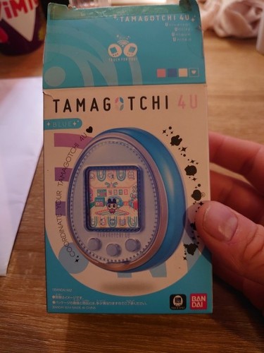 Tamagotchi blue with gold - 4u,