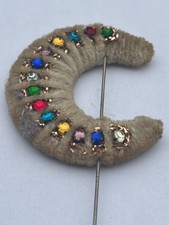 Vintage Woollen crescent hatpin with coloured small stones