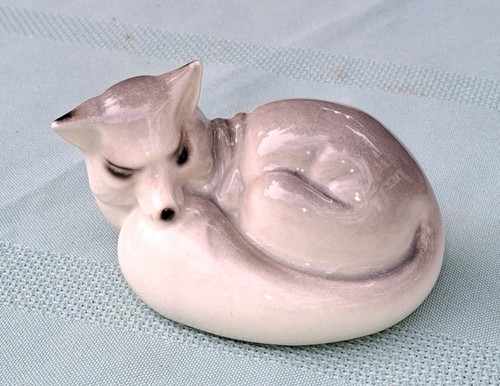 Vintage small ceramic curled - small,