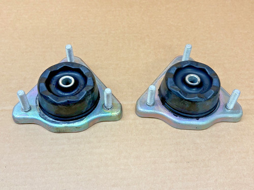 Pair front shock strut top - of,
