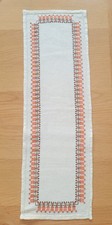 Swedish table runner with orange and brown embroidery