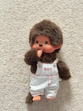 Monchhichi boy with white dungarees 