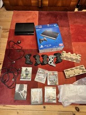 Boxed PlayStation 3 Super Slim PS3 - 500GB HDD, Controllers, 6 Games & Leads