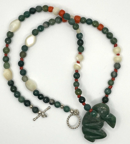 Artisan made necklace with - made,