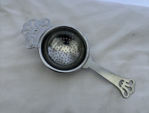 Silver tone tea - tone, strainer