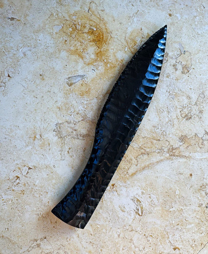Black obsidian flint knapped - obsidian,