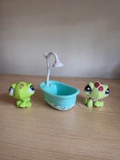 Littlest Pet Shops glitter turtle with blind bag turtle and Hasbro shower.