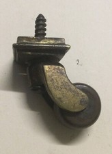 Antique Castor Brass And Brown