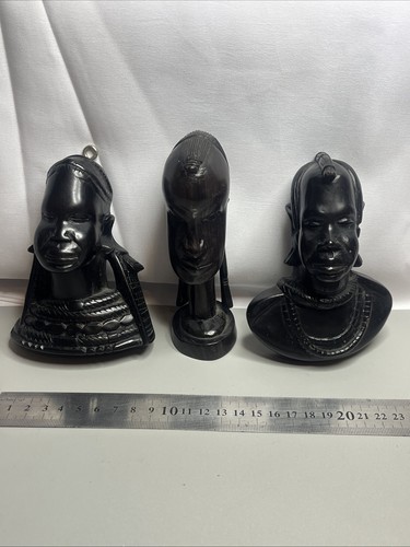 Carved tribal heads around - tribal,
