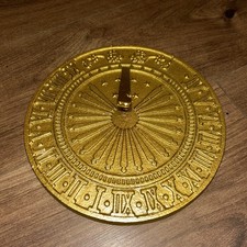 Sundial. Heavy Metal With Design With Brass Finish. Weighs 1.5kg