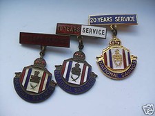 three national savings medals 7,10 & 20 years service