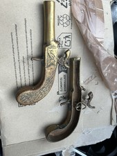 Pair Of Brass Wall Hanging Gun