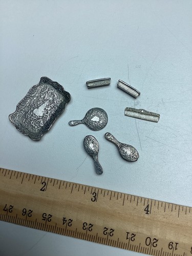 Tiny pewter doll - , house