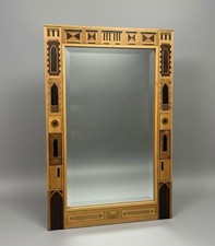A MARQUETRY MIRROR Sycamore