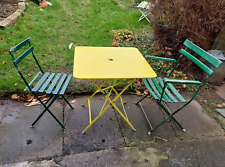 Vintage French foldable cafe bistro table and two chairs