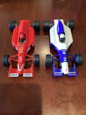 2 SCALEXTRIC   F1  CARS - WORKING-MINOLTA RAPID ( C2441) V PIONEER XEROX (C2440)