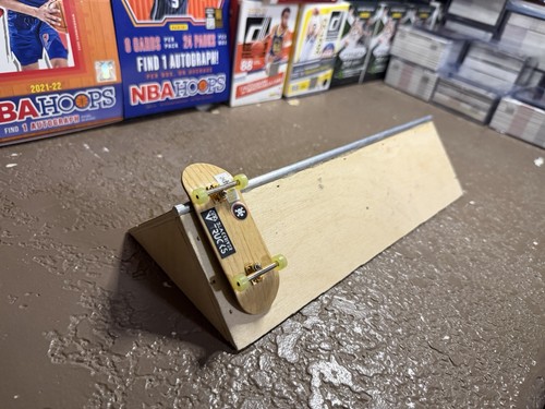 Fingerboard spine ramp - spine,