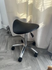 Saddle Chair. Hidrolic Type.  Wheels On Each Foot. Adjustable Black Saddle Comfy