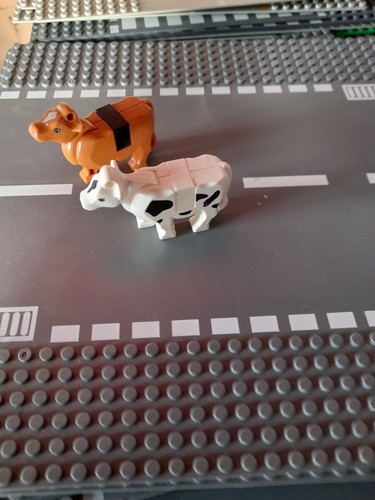Lego cow and horse - and,