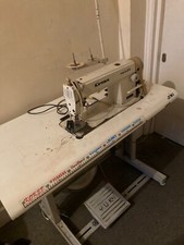 White sewing machine in perfect condition 