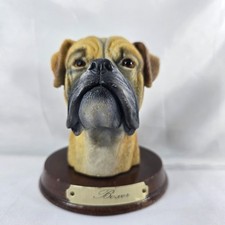 Boxer Dog Figurine on Wooden