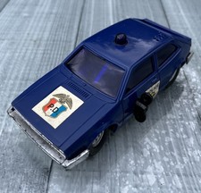VW VOLKSWAGEN SCIROCCO CLOCKWORK POLICE CAR PLASTIC WITH TWO-TONE AIR SIREN 782