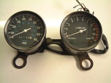 KAWASAKI KH100 - CLOCKS SPEEDO TACHO REV COUNTER BRACKET COMPLETE