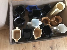 Pub jugs whiskey,bells,teachers,grouse,black bottle etc. Tobacco jugs also