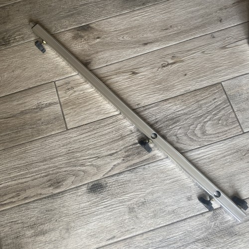 Extending feeder arm - -,