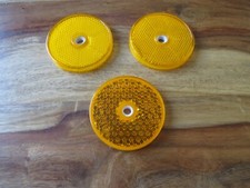 PRO-PLAST  ROUND REFLECTORS AMBER 60MM AND ONE UNBRANDED