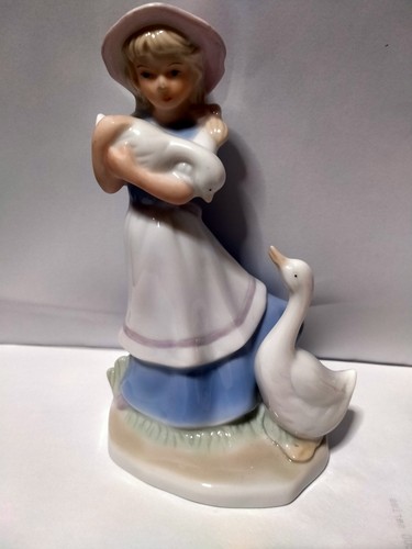 The goose girl figurine - goose,