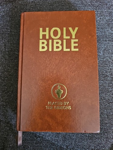 Holy bible placed the - holy, by