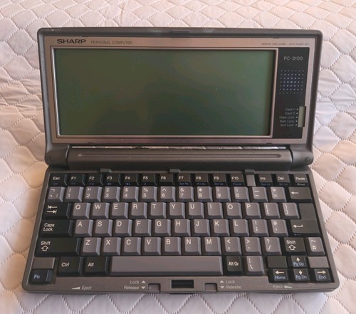 Sharp 3100 palmtop portable - sharp,
