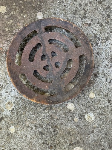 Vintage round cast - iron, drain
