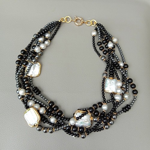 Strands white keshi - 21",