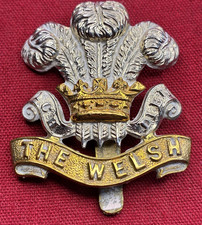 The Welsh Regiment British Military Cap Badge - Bimetal with brass slider