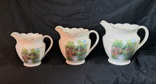 THREE FALCON WARE JUGS. Approx