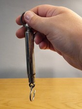 A vintage spring balance or hook scale. Marked LONDON REX.