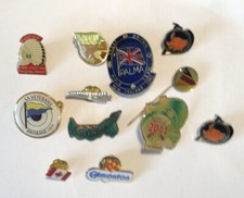 12 SHOOTING PIN LAPEL  BADGES - Various teams and  Countries
