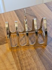 A small five bar toast racks with ring handles, 3" wide, Birmingham 1937