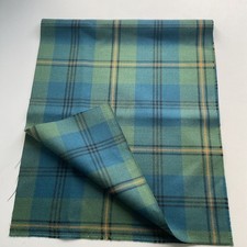 Johnstone muted tartan mediumweight  100%Wool fabric 81cm x 33cm