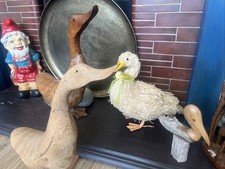 Four wooden display duck - display,