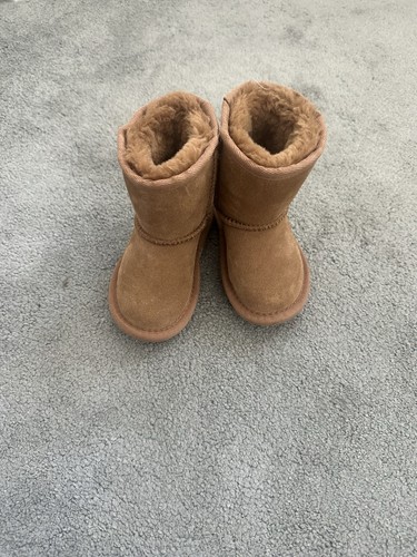 Baby girls next brown fur - baby,
