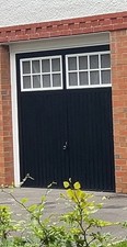 Traditional Black Steel Garage Door with Windows 2244 x 2039 