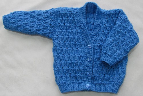 Hand knitted babies cardigan - hand,
