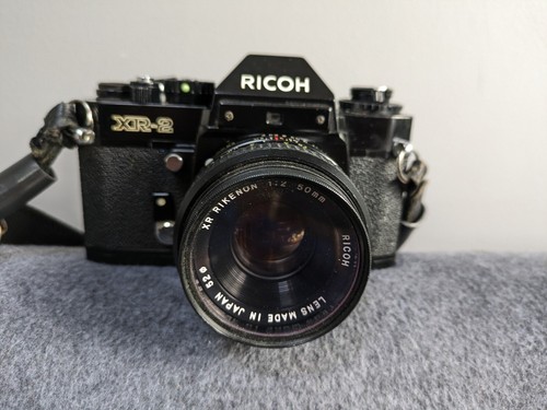 Ricoh camera with - with, xr